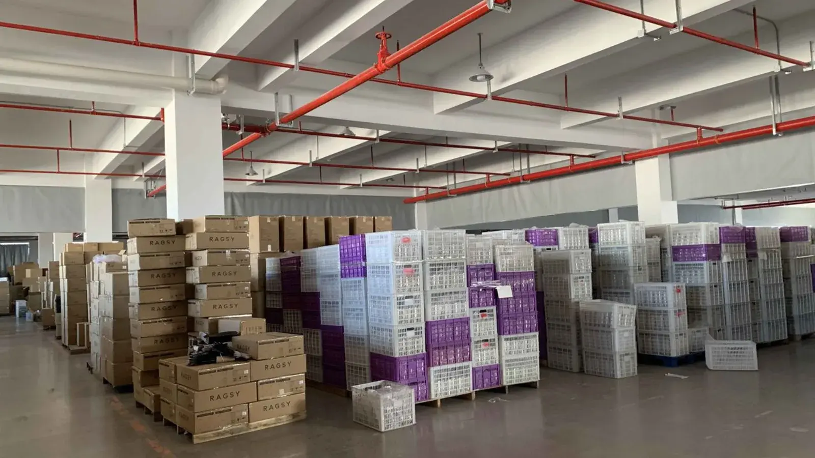 Export cartons staged in a China warehouse before an Amazon FBA inspection.