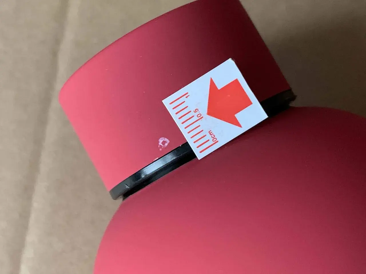Visible cosmetic defect marked on a finished product during inspection.