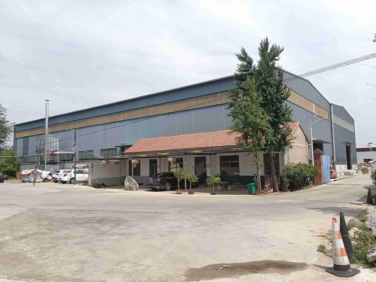 A factory exterior used to review site scale and infrastructure.