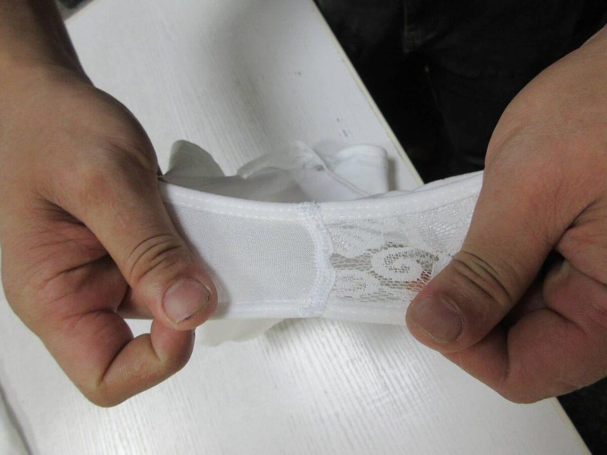 A material stretch test performed on a product sample.