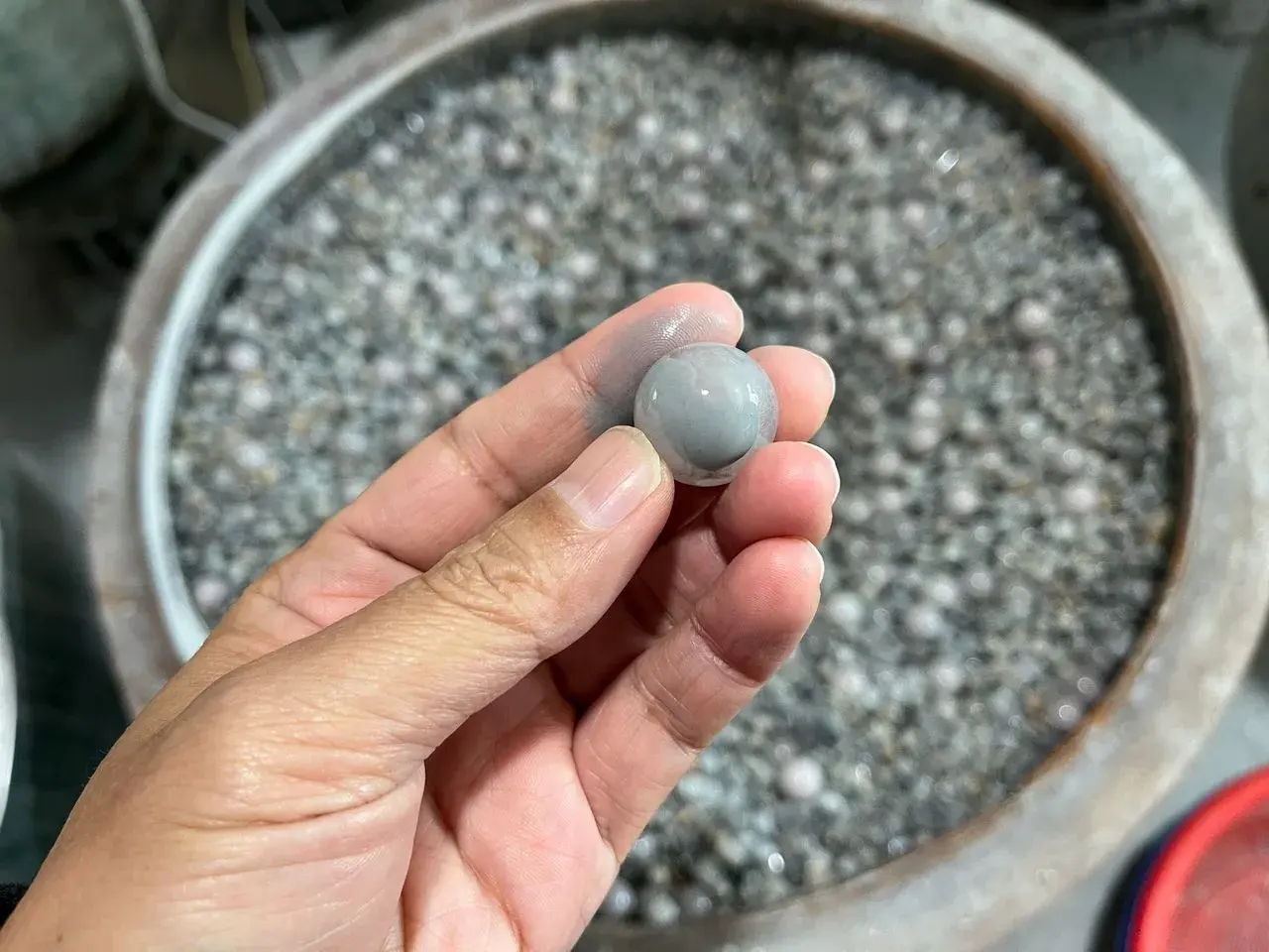 Material sample checked against production requirements before wider manufacturing.