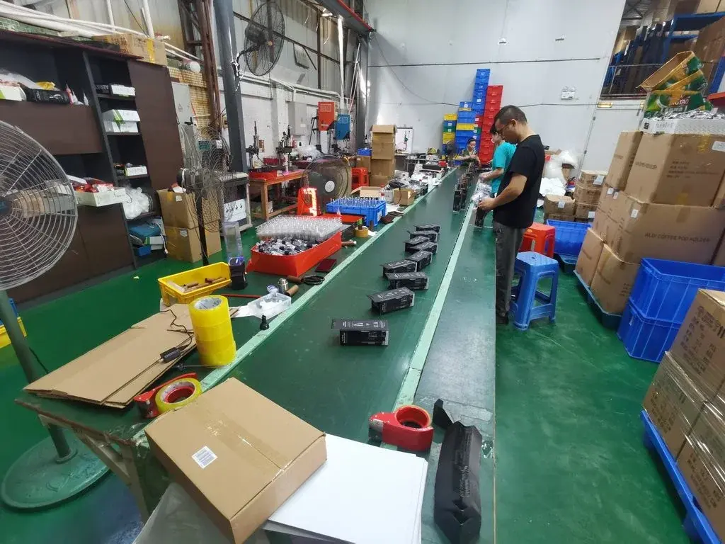 Factory production flow reviewed during a supplier audit.