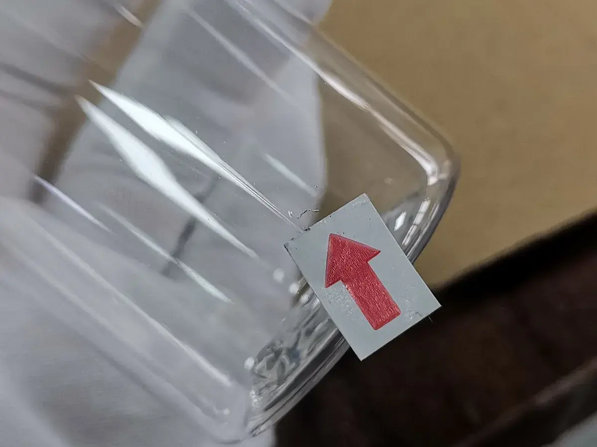 Close-up photo of a visible product defect marked during inspection.