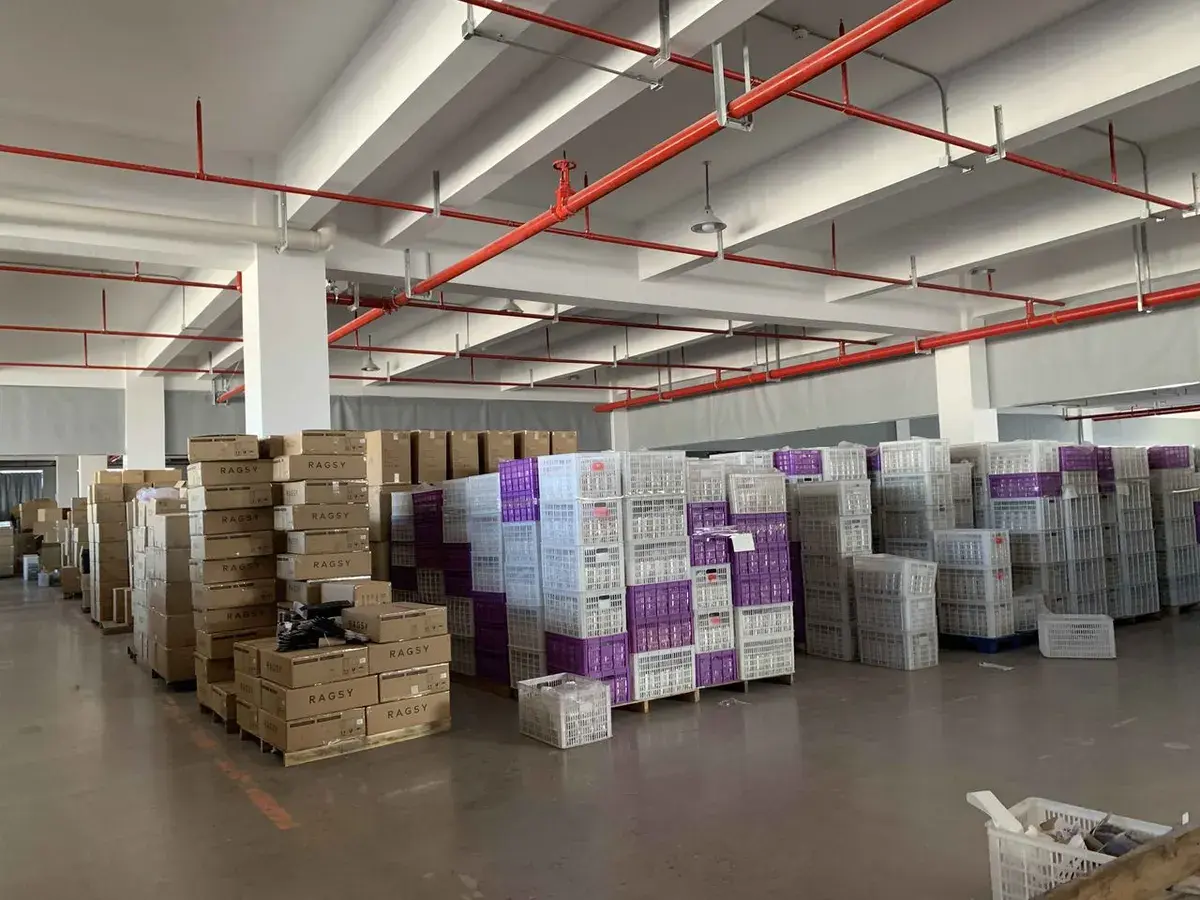 Finished goods and export cartons staged in a warehouse before inspection.